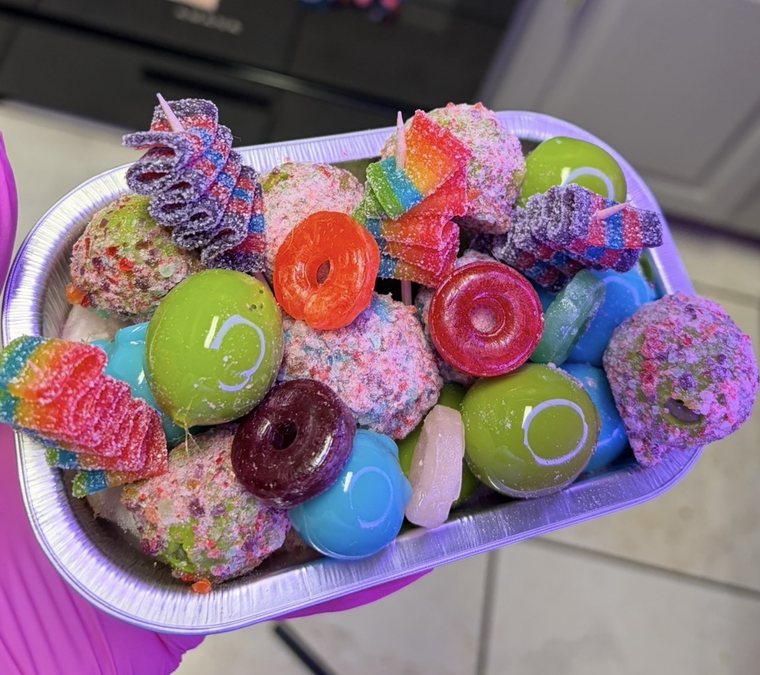 Candy fruit tray with candy grapes, sour belts and gummy rings by C & E Sweets